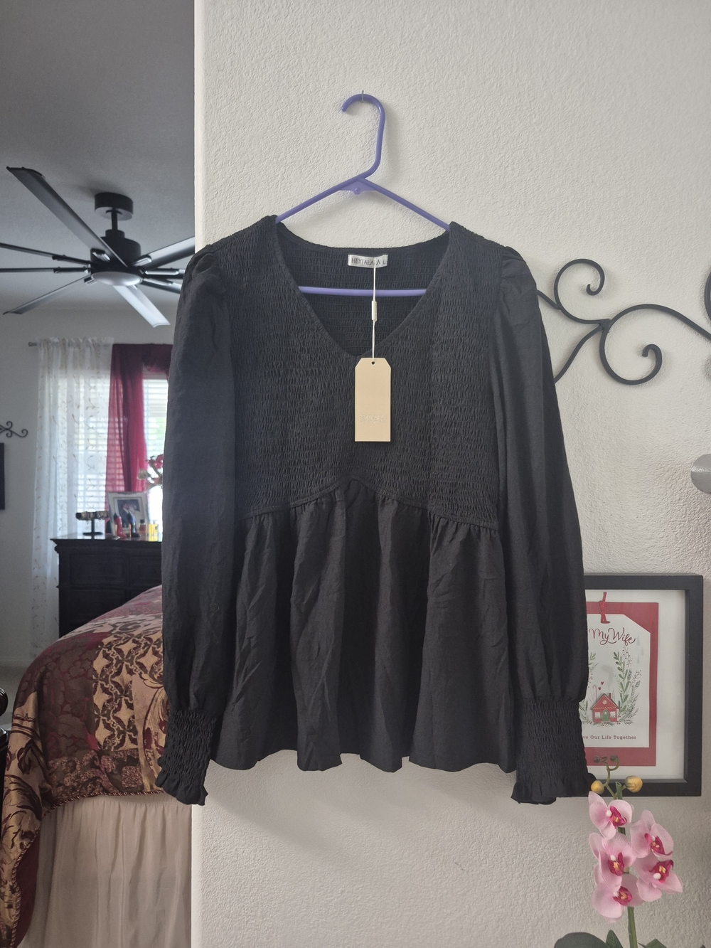 Alaia Black Smocked V-Neck Peplum Blouse